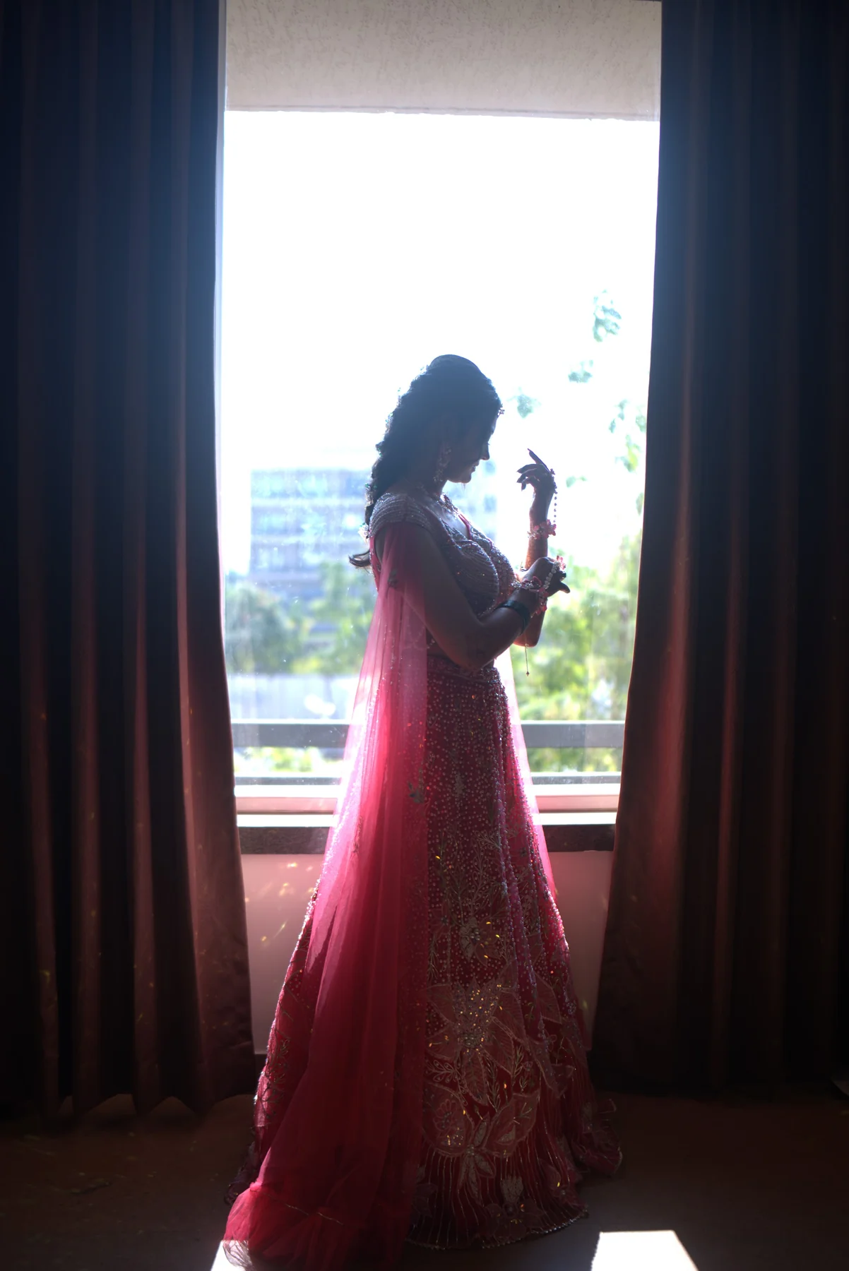 Dramatic Window Silhouette of Bride