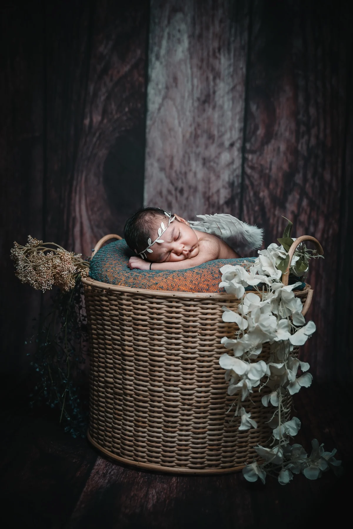 Newborn Baby Sleeping in Textured Wicker Basket