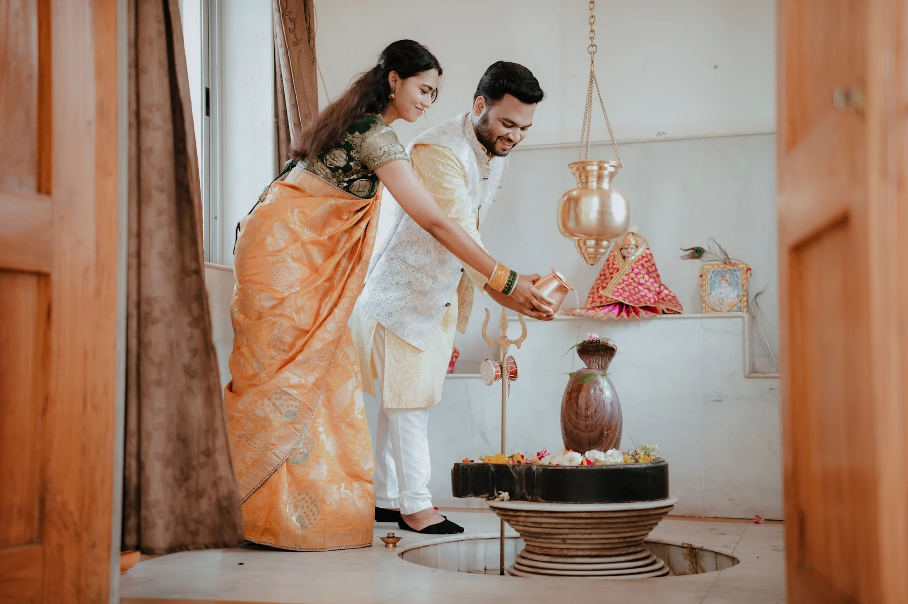 Couple Performing Sacred Temple Abhishekam