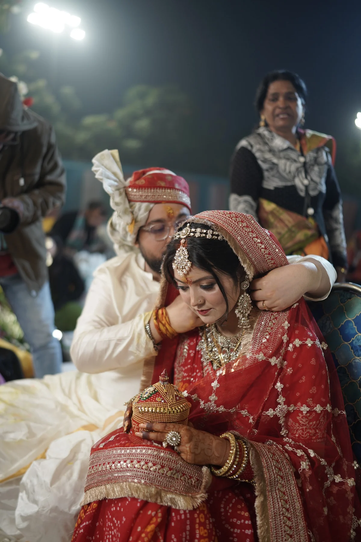 Joyful Bride and Groom Embracing at the Mandap