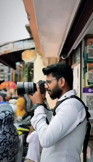 Ravi Kashyap — Founder and Lead Cinematographer of RV Studio holding professional Sony cinema camera